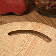 Small round bamboo chopping board for versatile kitchen cutting tasks