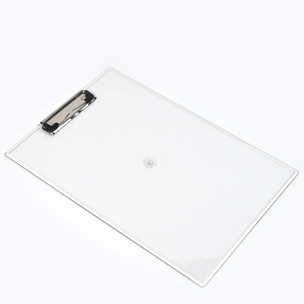 Transparent exam pad with measuring side