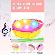 A toddler happily tapping on the durable Flash Drum Toy, enhancing motor skills.