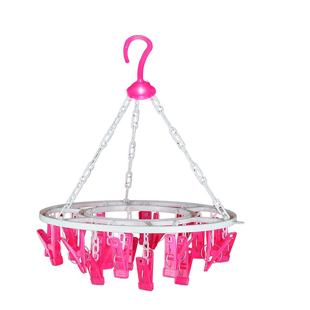 Round drying stand with 24 multicolour clips for hanging clothes.