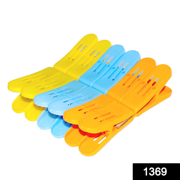 Durable plastic double pin clips in assorted colors for clothes.