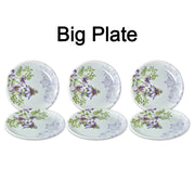 High-quality 32-piece plastic tableware set displayed on a table.