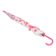 A neatly folded white umbrella with pink polka dots and a pink curved handle is secured with a pink strap.