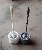 Side profile of the Pro Clean toilet cleaning brush and its compact potted holder.