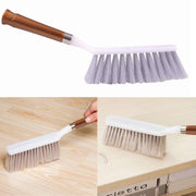 Sturdy household cleaning brush with a long handle, suitable for floors and various surfaces.