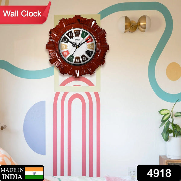 Plastic wall clock with wooden appearance