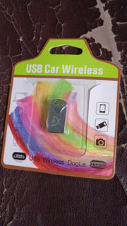 The USB Car Bluetooth Adapter shown from an angle, emphasizing its portable form factor.